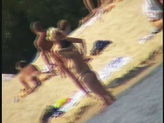 Busty nudist beach MILF caught on a hidden cam