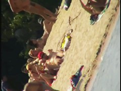 A dirty beach voyeur loves filming with his spy cam.