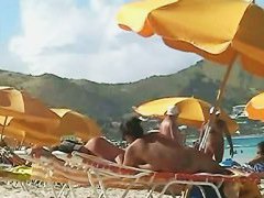 Beach voyeur video of a nude milf and a nude Asian hottie