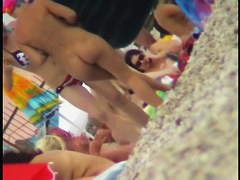 Hidden cam on a nudist beach shows men and women