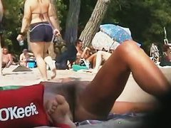 Hairy pussy and big booty all naked at the beach