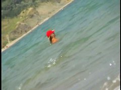 Nice babes are being filmed on camera on the beach