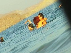 Ladies on the nudist beach exposed to the hidden cam