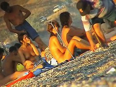 Ladies on the nudist beach exposed to the hidden cam