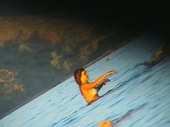 Ladies on the nudist beach exposed to the hidden cam