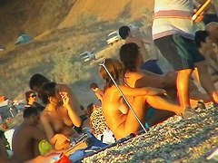 Ladies on the nudist beach exposed to the hidden cam