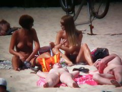 2 white babes with nice big side saggin breasts on a nude beach
