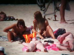 2 white babes with nice big side saggin breasts on a nude beach