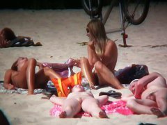 2 white babes with nice big side saggin breasts on a nude beach