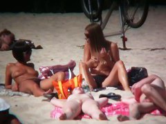 2 white babes with nice big side saggin breasts on a nude beach