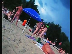 A voracious voyeur loves making videos on the nude beach.