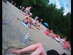 A voracious voyeur loves making videos on the nude beach.