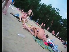A voracious voyeur loves making videos on the nude beach.