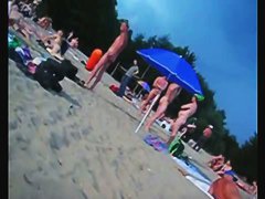 A voracious voyeur loves making videos on the nude beach.