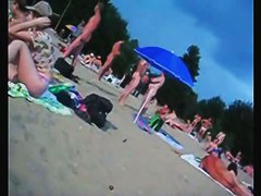 A voracious voyeur loves making videos on the nude beach.