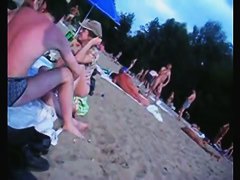 A voracious voyeur loves making videos on the nude beach.