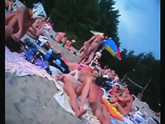 A voracious voyeur loves making videos on the nude beach.