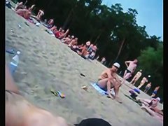 A voracious voyeur loves making videos on the nude beach.