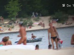 Blonde mature chick is naked at the beach