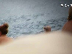 Blonde mature chick is naked at the beach