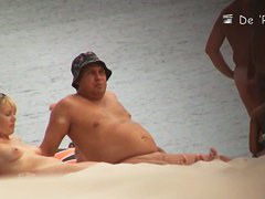 Blonde mature chick is naked at the beach