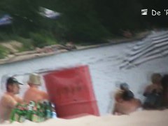 Blonde mature chick is naked at the beach