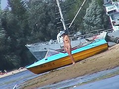 Beautiful chicks playing at the beach while I film the