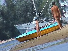 Beautiful chicks playing at the beach while I film the