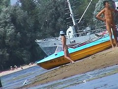 Beautiful chicks playing at the beach while I film the