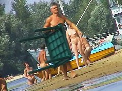 Beautiful chicks playing at the beach while I film the