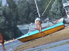 Beautiful chicks playing at the beach while I film the