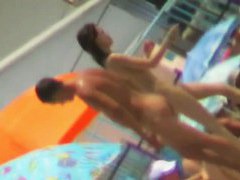 Spy beach cams film hot nudist girls playing in the water
