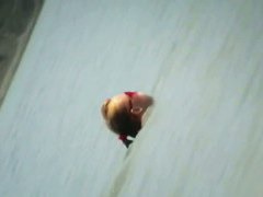 Spy beach cams film hot nudist girls playing in the water