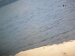 Playful chicks demonstrate their tits in the nude beach