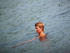 Playful chicks demonstrate their tits in the nude beach