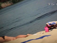 Playful chicks demonstrate their tits in the nude beach