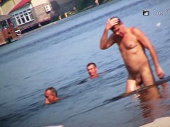 Playful chicks demonstrate their tits in the nude beach