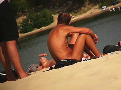 wide open and bending over on the beach with the nudists