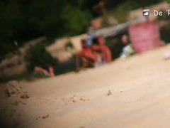 wide open and bending over on the beach with the nudists