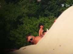 Nude beach voyeur spyes on sexy girls.