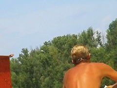 Gorgeous young nudist beach voyeur vid