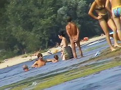 Hot mature women filmed by a voyeur on the nudist beach