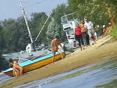 Hot mature women filmed by a voyeur on the nudist beach