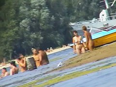 Hot mature women filmed by a voyeur on the nudist beach
