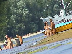 Hot mature women filmed by a voyeur on the nudist beach