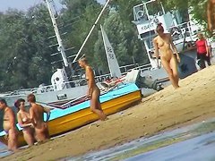 Hot mature women filmed by a voyeur on the nudist beach