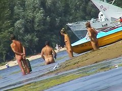Hot mature women filmed by a voyeur on the nudist beach
