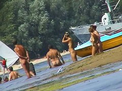 Hot mature women filmed by a voyeur on the nudist beach