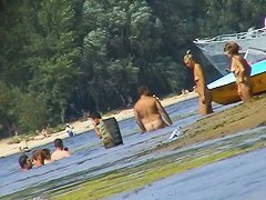 Hot mature women filmed by a voyeur on the nudist beach