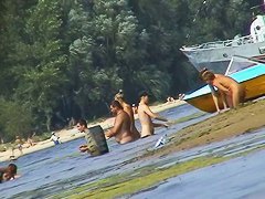 Hot mature women filmed by a voyeur on the nudist beach